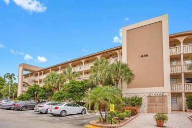 This top-floor condo is situated in Wynmoor's golf community and on Wynmoor Golf Course in Florida - for sale on GolfHomes.com, golf home, golf lot