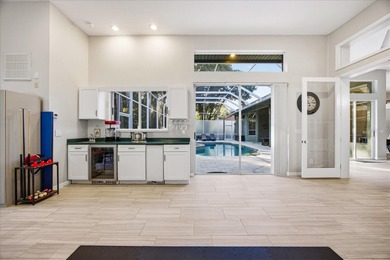 Welcome to this exceptional Costanza custom-built home on Tarpon Woods Golf Club in Florida - for sale on GolfHomes.com, golf home, golf lot