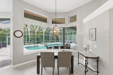 Welcome to this exceptional Costanza custom-built home on Tarpon Woods Golf Club in Florida - for sale on GolfHomes.com, golf home, golf lot