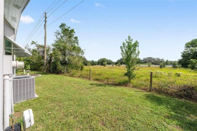Welcome home to this charming 2-bedroom, 2 bath manufactured on El Diablo Executive Golf Course in Florida - for sale on GolfHomes.com, golf home, golf lot