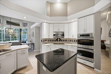 Welcome to this exceptional Costanza custom-built home on Tarpon Woods Golf Club in Florida - for sale on GolfHomes.com, golf home, golf lot