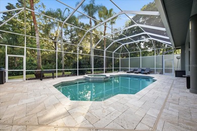 Welcome to this exceptional Costanza custom-built home on Tarpon Woods Golf Club in Florida - for sale on GolfHomes.com, golf home, golf lot