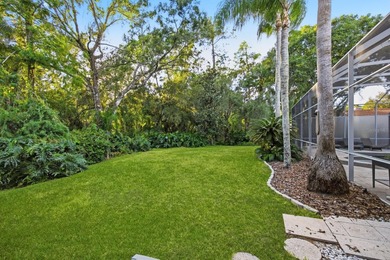 Welcome to this exceptional Costanza custom-built home on Tarpon Woods Golf Club in Florida - for sale on GolfHomes.com, golf home, golf lot