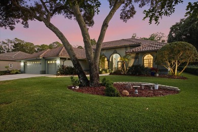 Welcome to this exceptional Costanza custom-built home on Tarpon Woods Golf Club in Florida - for sale on GolfHomes.com, golf home, golf lot