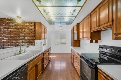 Beautifully positioned on the golf course within a prestigious on Canyon Lake Country Club in California - for sale on GolfHomes.com, golf home, golf lot