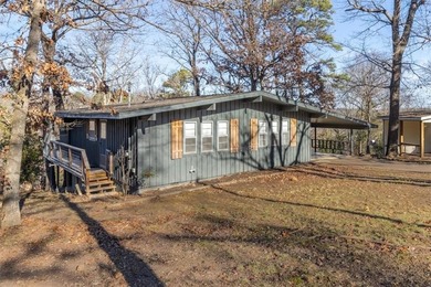 Charming 2-bedroom, 1.5-bath Bella Vista home featuring a on Bella Vista Country Club and Golf Course in Arkansas - for sale on GolfHomes.com, golf home, golf lot