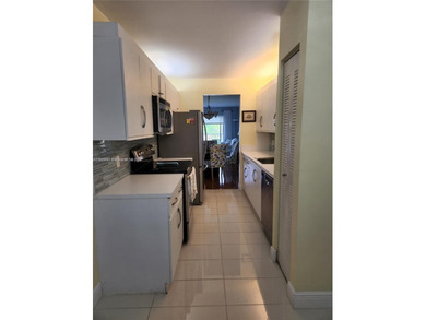 Discover this bright and spacious 2-bedroom, 2 bath condo with on Flamingo Lakes Country Club in Florida - for sale on GolfHomes.com, golf home, golf lot
