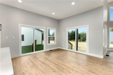 Looking for a high-quality lake home? Come see this newly on Linn Valley Lakes - Deer Trace Golf Course in Kansas - for sale on GolfHomes.com, golf home, golf lot