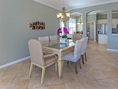 Enjoy the best of Florida style living in this WCI Ghiberti on Venetian Golf and River Club in Florida - for sale on GolfHomes.com, golf home, golf lot