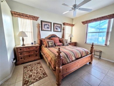 This beautifully maintained south-facing attached villa is on Fiddlesticks Country Club in Florida - for sale on GolfHomes.com, golf home, golf lot