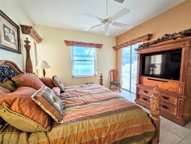 This beautifully maintained south-facing attached villa is on Fiddlesticks Country Club in Florida - for sale on GolfHomes.com, golf home, golf lot