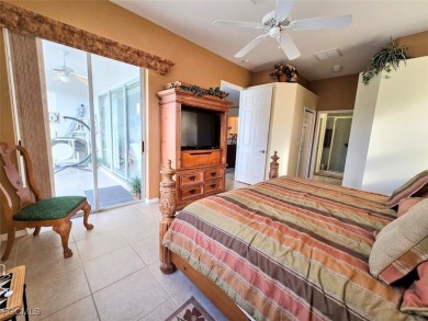 This beautifully maintained south-facing attached villa is on Fiddlesticks Country Club in Florida - for sale on GolfHomes.com, golf home, golf lot