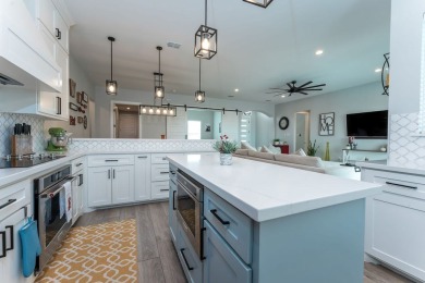 This exquisite custom-built home offers 4 bedrooms, 3 full baths on South Padre Island Golf Club in Texas - for sale on GolfHomes.com, golf home, golf lot