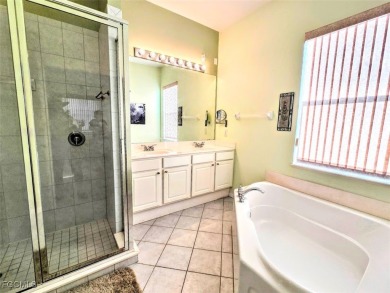 This beautifully maintained south-facing attached villa is on Fiddlesticks Country Club in Florida - for sale on GolfHomes.com, golf home, golf lot