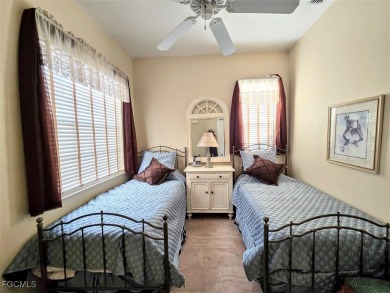 This beautifully maintained south-facing attached villa is on Fiddlesticks Country Club in Florida - for sale on GolfHomes.com, golf home, golf lot