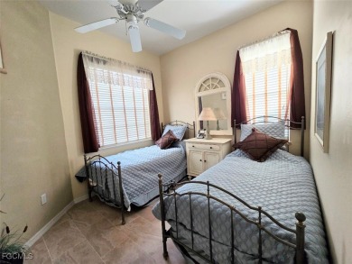 This beautifully maintained south-facing attached villa is on Fiddlesticks Country Club in Florida - for sale on GolfHomes.com, golf home, golf lot