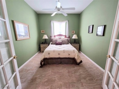 This beautifully maintained south-facing attached villa is on Fiddlesticks Country Club in Florida - for sale on GolfHomes.com, golf home, golf lot