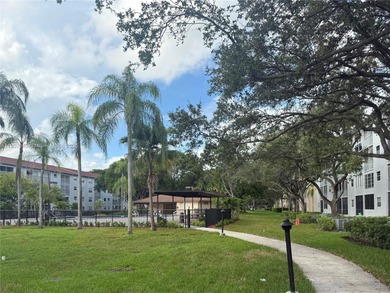 Discover this bright and spacious 2-bedroom, 2 bath condo with on Flamingo Lakes Country Club in Florida - for sale on GolfHomes.com, golf home, golf lot