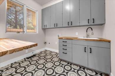 Stunning completely remodeled one-story home on the 5th hole of on LakeRidge Golf Course in Nevada - for sale on GolfHomes.com, golf home, golf lot