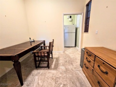 This beautifully maintained south-facing attached villa is on Fiddlesticks Country Club in Florida - for sale on GolfHomes.com, golf home, golf lot