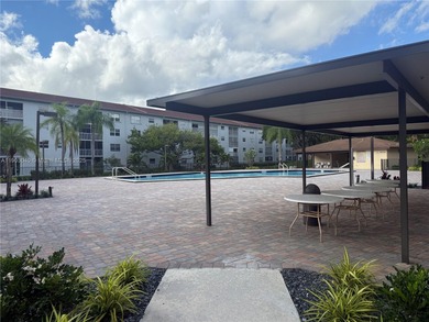 Discover this bright and spacious 2-bedroom, 2 bath condo with on Flamingo Lakes Country Club in Florida - for sale on GolfHomes.com, golf home, golf lot