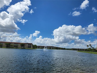 Discover this bright and spacious 2-bedroom, 2 bath condo with on Flamingo Lakes Country Club in Florida - for sale on GolfHomes.com, golf home, golf lot