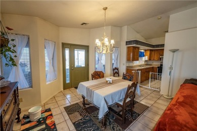 Nestled at 7820 E Devils Arch Dr, Kingman, Arizona, this on Valle Vista Golf Course in Arizona - for sale on GolfHomes.com, golf home, golf lot