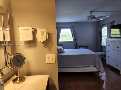 Discover this bright and spacious 2-bedroom, 2 bath condo with on Flamingo Lakes Country Club in Florida - for sale on GolfHomes.com, golf home, golf lot