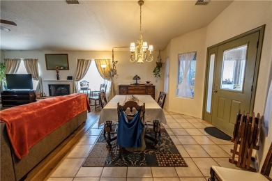 Nestled at 7820 E Devils Arch Dr, Kingman, Arizona, this on Valle Vista Golf Course in Arizona - for sale on GolfHomes.com, golf home, golf lot