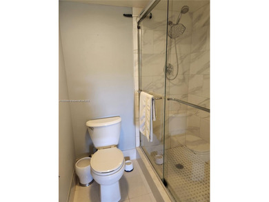 Discover this bright and spacious 2-bedroom, 2 bath condo with on Flamingo Lakes Country Club in Florida - for sale on GolfHomes.com, golf home, golf lot