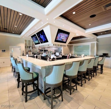 This beautifully maintained south-facing attached villa is on Fiddlesticks Country Club in Florida - for sale on GolfHomes.com, golf home, golf lot