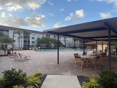 Discover this bright and spacious 2-bedroom, 2 bath condo with on Flamingo Lakes Country Club in Florida - for sale on GolfHomes.com, golf home, golf lot