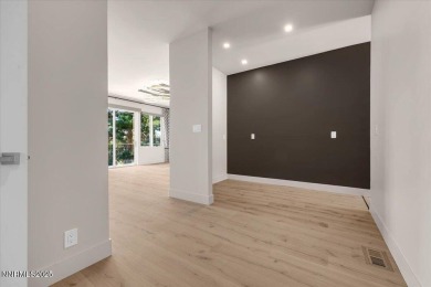 Stunning completely remodeled one-story home on the 5th hole of on LakeRidge Golf Course in Nevada - for sale on GolfHomes.com, golf home, golf lot
