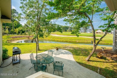 This expansive residence boasts 3 bedrooms, 3.5 bathrooms, and on Oyster Bay Golf Links in North Carolina - for sale on GolfHomes.com, golf home, golf lot
