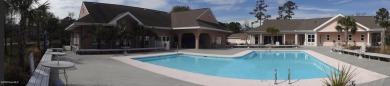 This expansive residence boasts 3 bedrooms, 3.5 bathrooms, and on Oyster Bay Golf Links in North Carolina - for sale on GolfHomes.com, golf home, golf lot