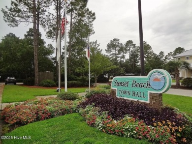 This expansive residence boasts 3 bedrooms, 3.5 bathrooms, and on Oyster Bay Golf Links in North Carolina - for sale on GolfHomes.com, golf home, golf lot