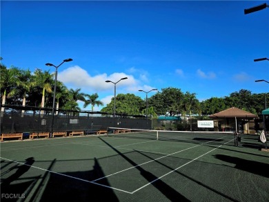 This beautifully maintained south-facing attached villa is on Fiddlesticks Country Club in Florida - for sale on GolfHomes.com, golf home, golf lot