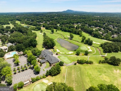 Nestled within the prestigious Polo Golf & Country Club on Polo Golf and Country Club in Georgia - for sale on GolfHomes.com, golf home, golf lot