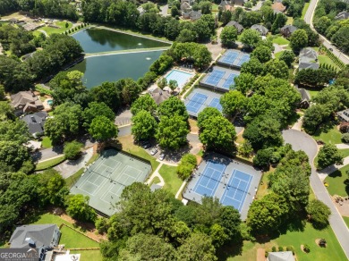 Nestled within the prestigious Polo Golf & Country Club on Polo Golf and Country Club in Georgia - for sale on GolfHomes.com, golf home, golf lot
