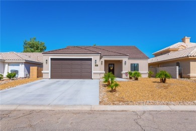 Gorgeous 2022-built home located on the Hukan Golf Course in the on Desert Lakes Golf Course in Arizona - for sale on GolfHomes.com, golf home, golf lot