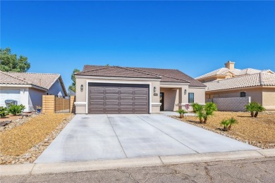 Gorgeous 2022-built home located on the Hukan Golf Course in the on Desert Lakes Golf Course in Arizona - for sale on GolfHomes.com, golf home, golf lot