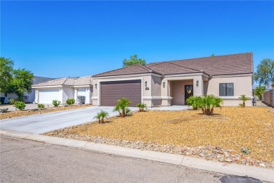 Gorgeous 2022-built home located on the Hukan Golf Course in the on Desert Lakes Golf Course in Arizona - for sale on GolfHomes.com, golf home, golf lot