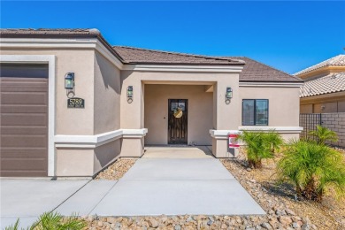 Gorgeous 2022-built home located on the Hukan Golf Course in the on Desert Lakes Golf Course in Arizona - for sale on GolfHomes.com, golf home, golf lot