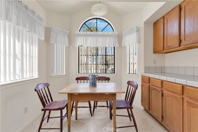 This charming home is in the highly sought-after gated community on Ashwood Golf Course in California - for sale on GolfHomes.com, golf home, golf lot