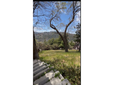 Moderately sloped vacant land in Lake Arrowhead Woods. This lot on Lake Arrowhead Country Club in California - for sale on GolfHomes.com, golf home, golf lot