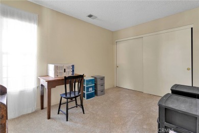 This charming home is in the highly sought-after gated community on Ashwood Golf Course in California - for sale on GolfHomes.com, golf home, golf lot