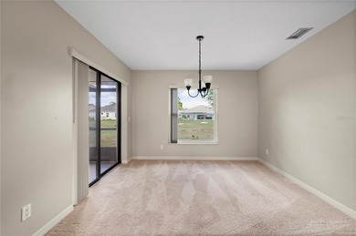 Three Bedroom, Two Bath, attached Two Car Garage Home located on on Deep Creek Golf Club in Florida - for sale on GolfHomes.com, golf home, golf lot