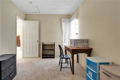 This charming home is in the highly sought-after gated community on Ashwood Golf Course in California - for sale on GolfHomes.com, golf home, golf lot