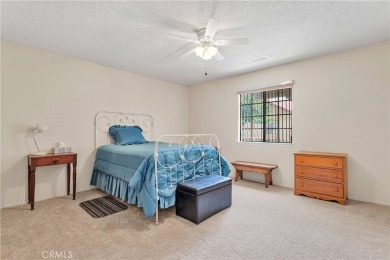 This charming home is in the highly sought-after gated community on Ashwood Golf Course in California - for sale on GolfHomes.com, golf home, golf lot