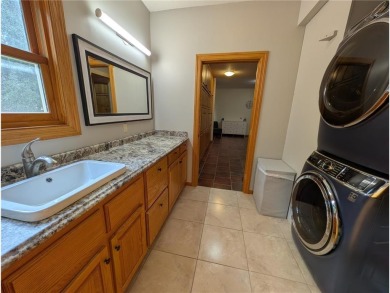 Stunning 4-bedroom, 3-bathroom home offering nearly 5,000 sq ft on Zumbrota Golf Club in Minnesota - for sale on GolfHomes.com, golf home, golf lot